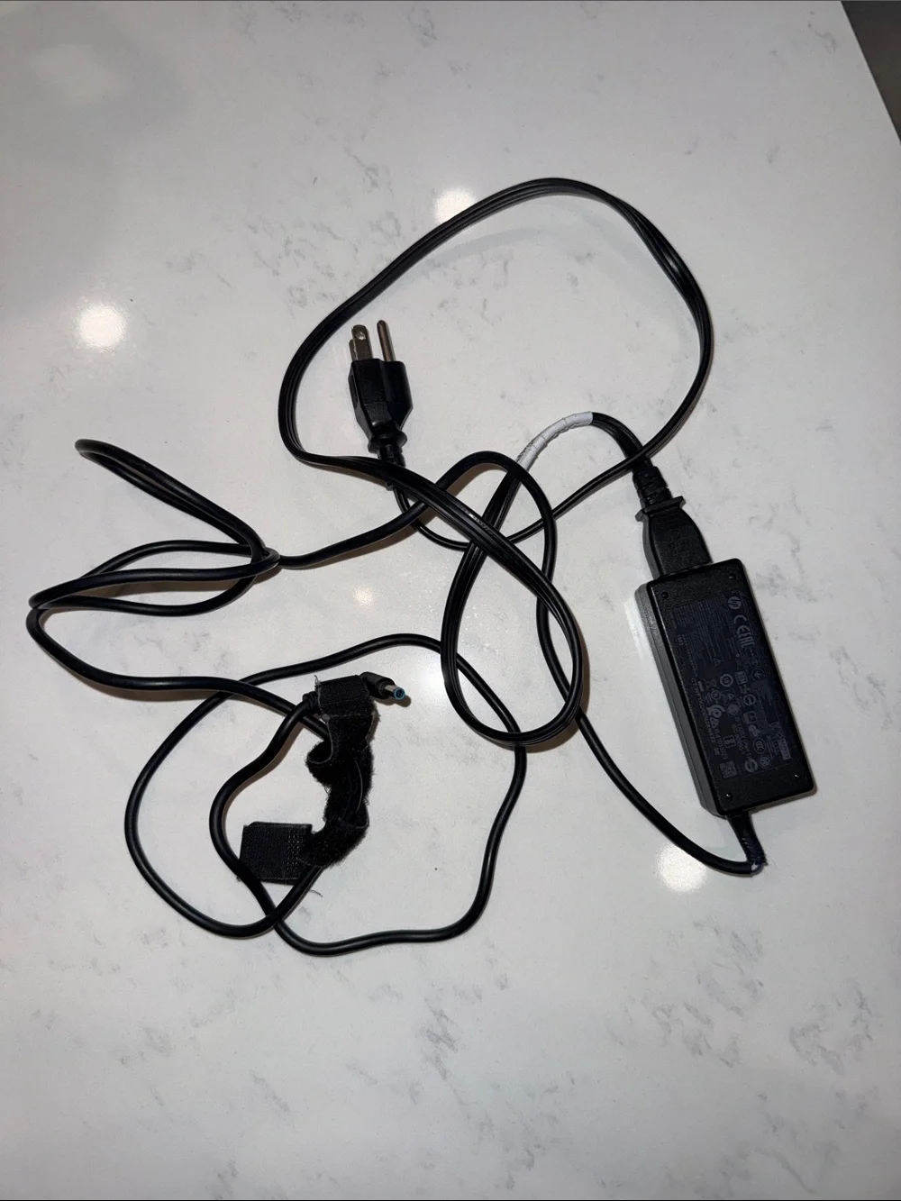 HP 45W Smart AC Adapter laptop charger with blue tip connector